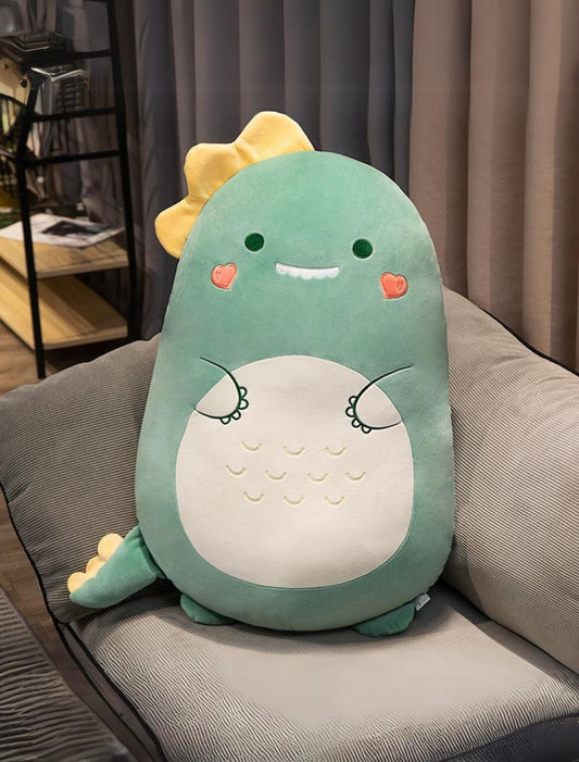 Coussin peluche dinosaure vert